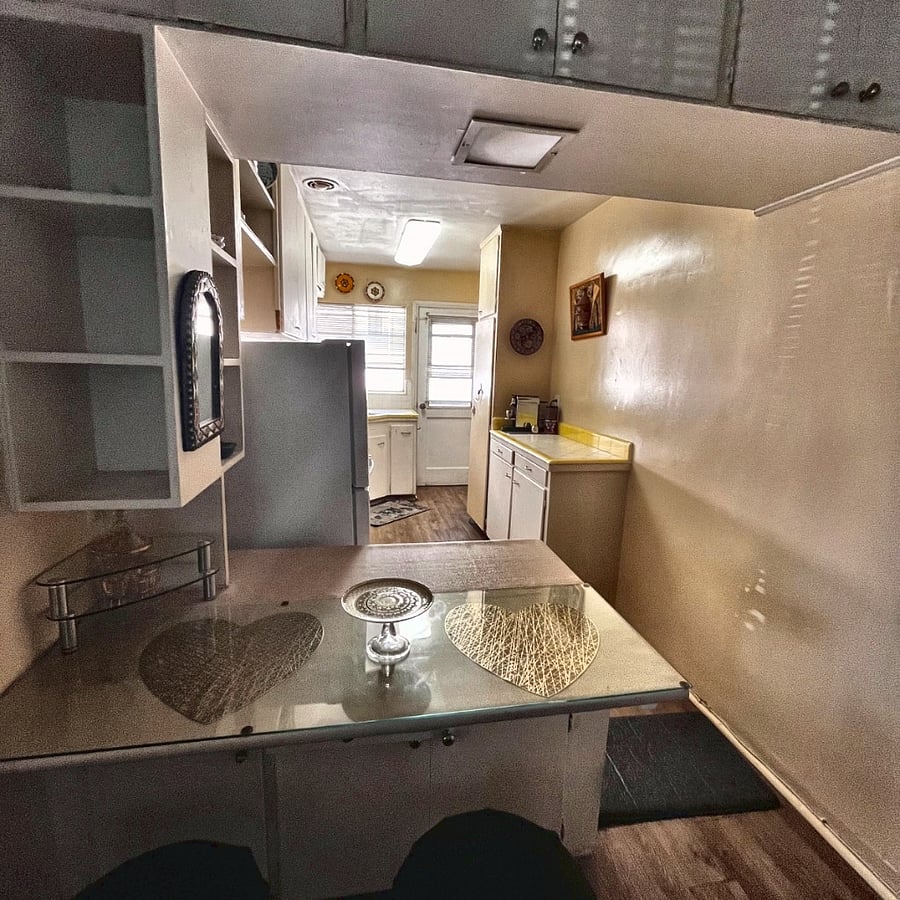 Fully Equipped Turnkey Kitchen: Complete with a gas range, full refrigerator, custom cabinetry, a Nespresso machine, and an Air Fryer for easy meals.
