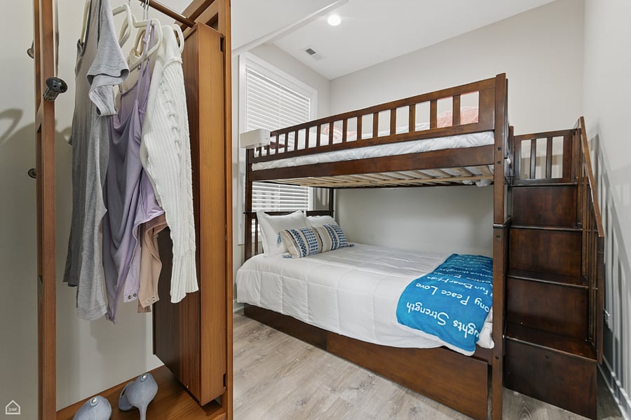 This solid wood, standing wardrobe offers hanging space, shelves for shoes, a hidden jewelry compartment, and a full-length mirror that spins.