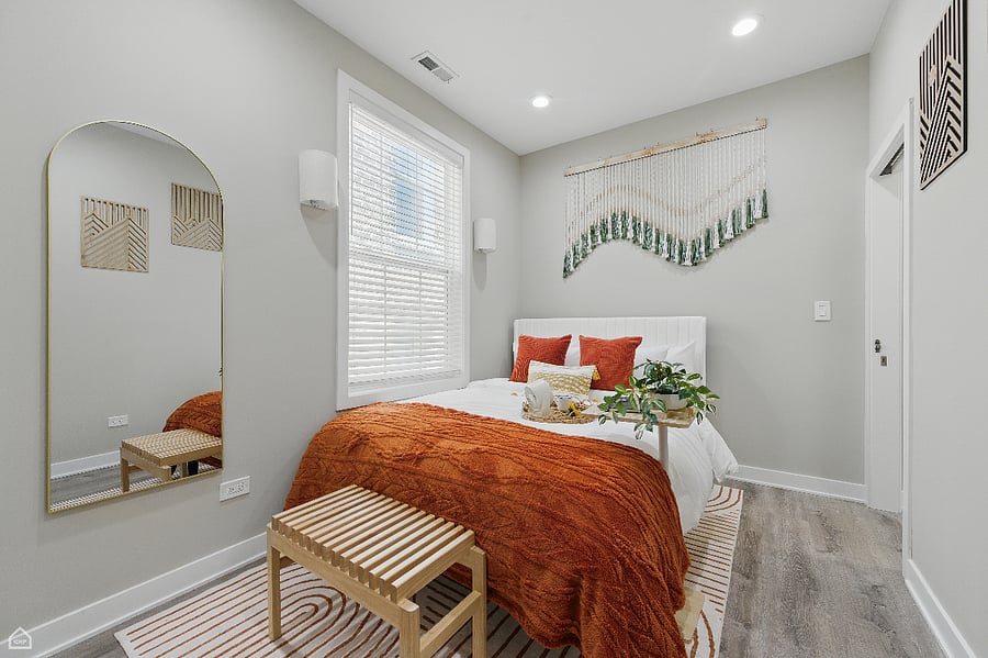 Warm tones and natural textures give this bedroom a welcoming, grounded feel.