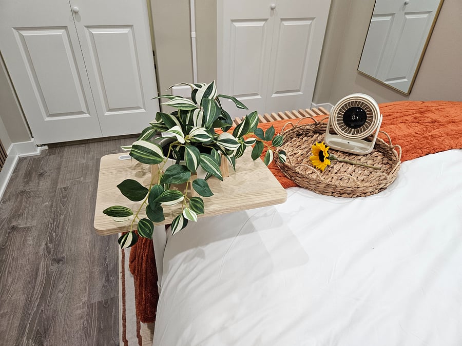 A few thoughtful touches for your bedside wind-down: a personal fan for warm nights, a cozy blanket for cold nights, and comfy sheets for every night.