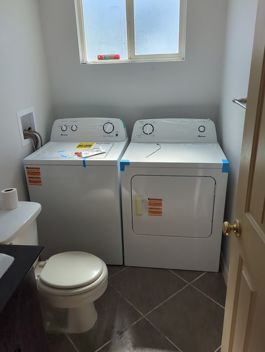 Downstairs Private Laundry Room, toilet and sink