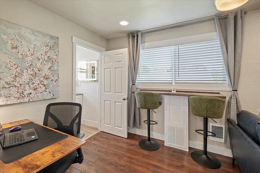 Family Room upstairs with dedicated coffee corner and laptop station and bar stools