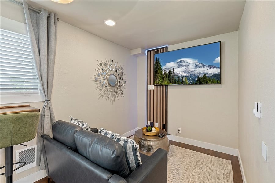 Family room located upstairs equipped with SMART TV