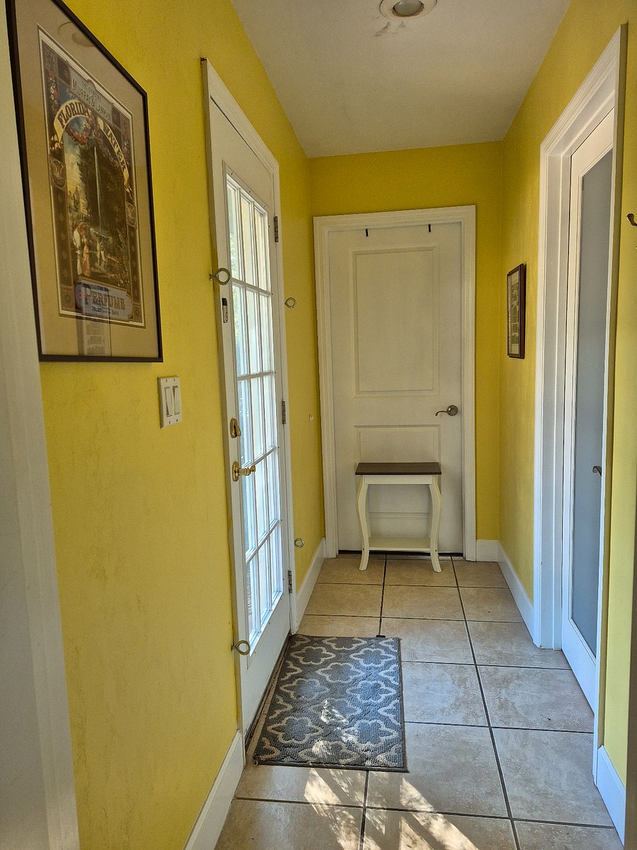 hallway from living area to bathroom and yard