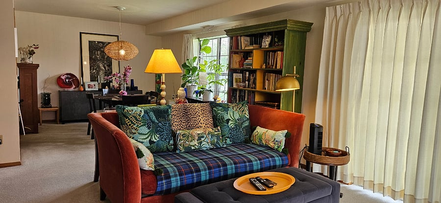 View of one section of the Living Room, facing the Dining Area. Just beyond the drapery (at right) is the large front patio