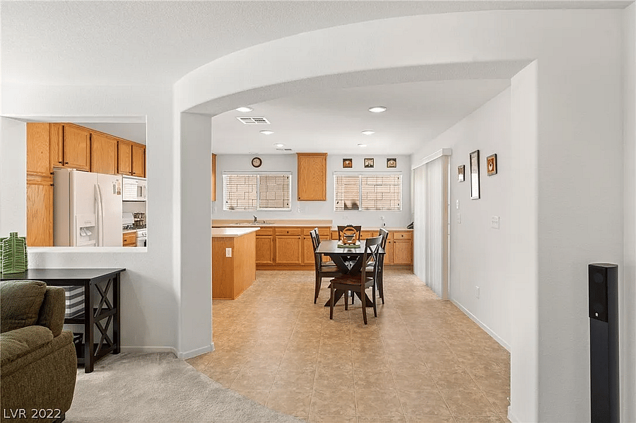 Wide shot of the kitchen, fully stocked with cooking supplies (ingredients and pots/pans).