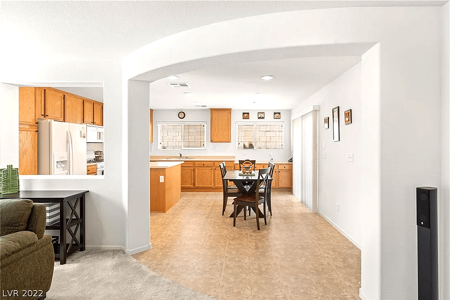 Wide shot of the kitchen, fully stocked with cooking supplies (ingredients and pots/pans).