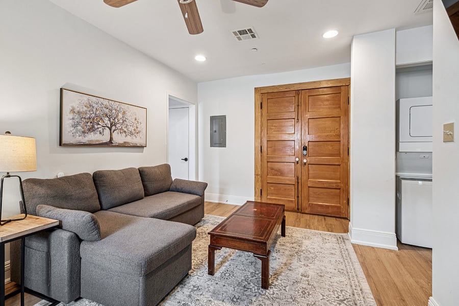Living room, facing the entry. Laundry located on the right of this photo.