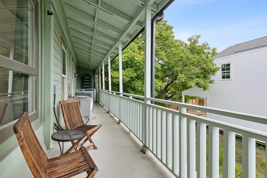 Covered balcony. The balcony can be accessed through both bedrooms.
