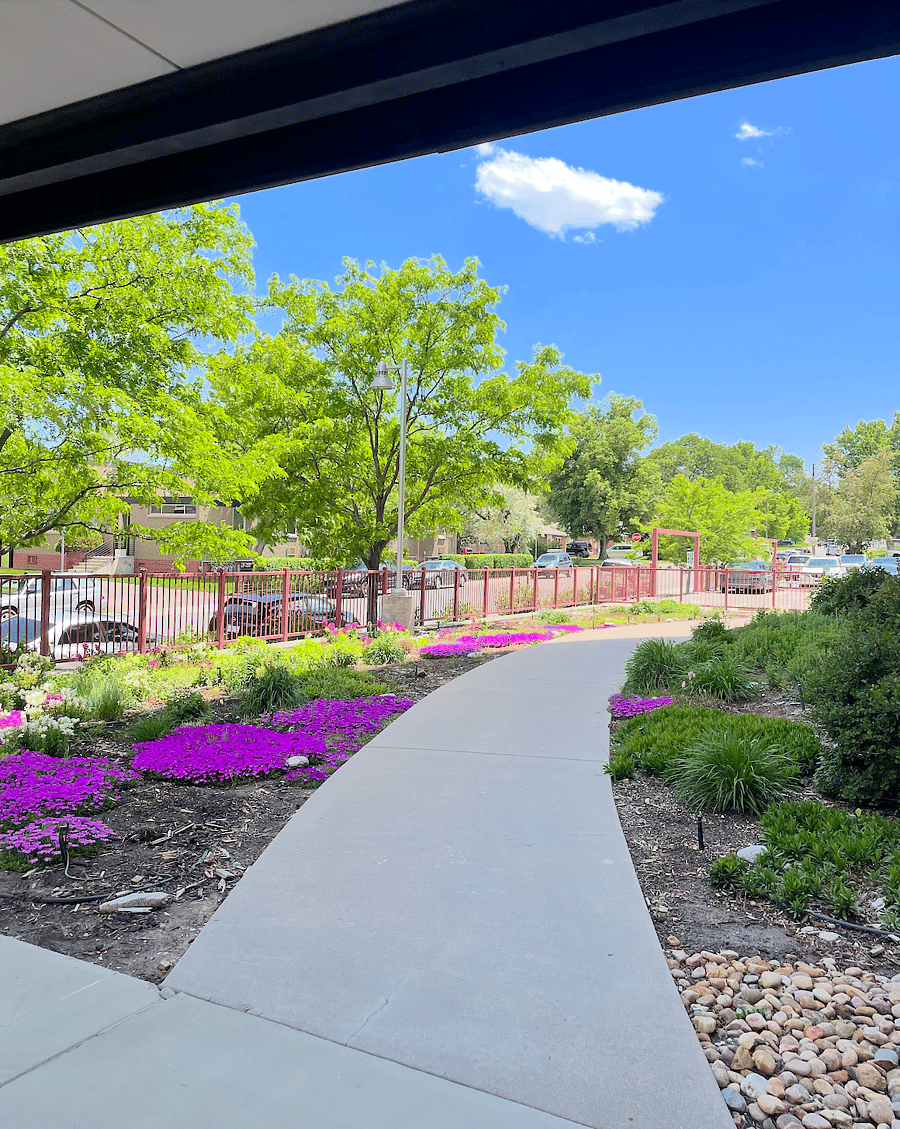Entrance/shows wheelchair accessible ramp (there are stairs as well). Lots of street parking (1 garage spot included).