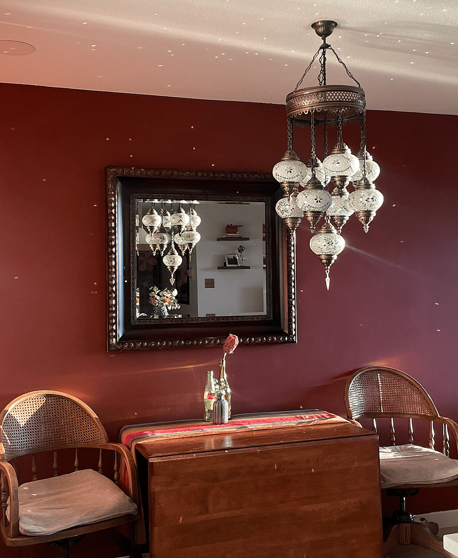 The dining area at golden hour, when the sun hits the light so perfectly and creates a beautiful and relaxing ambiance.