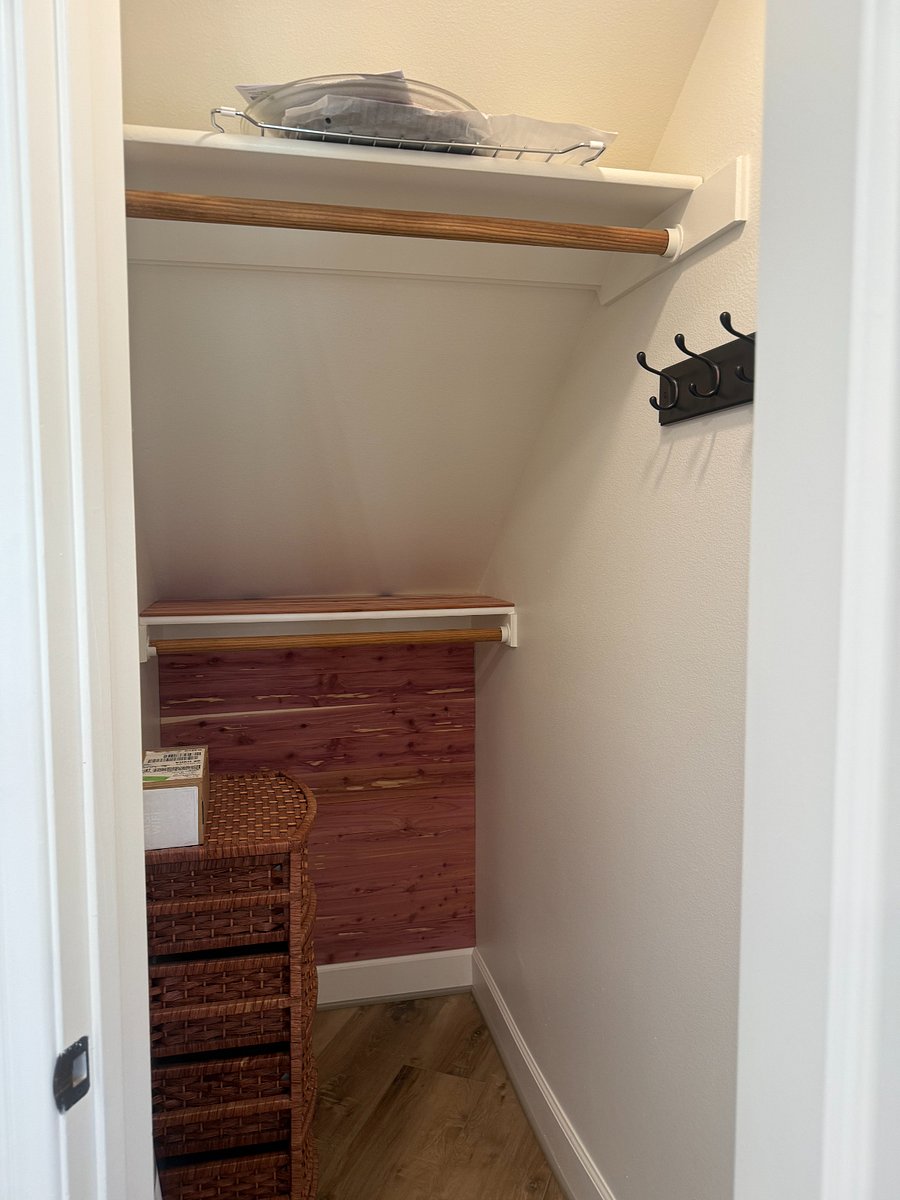 Spacious closet with plenty of extra storage space.