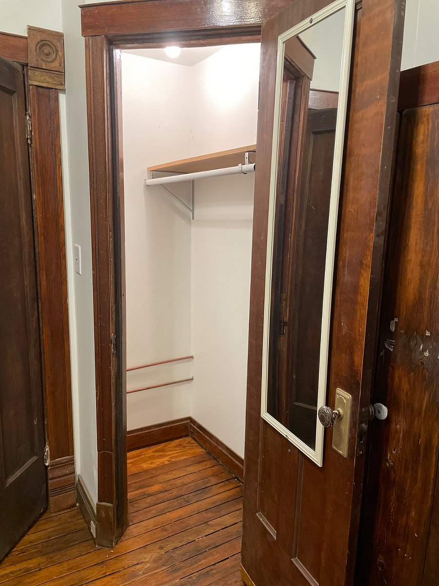 Closet is adjacent to the bathroom and has a mirror