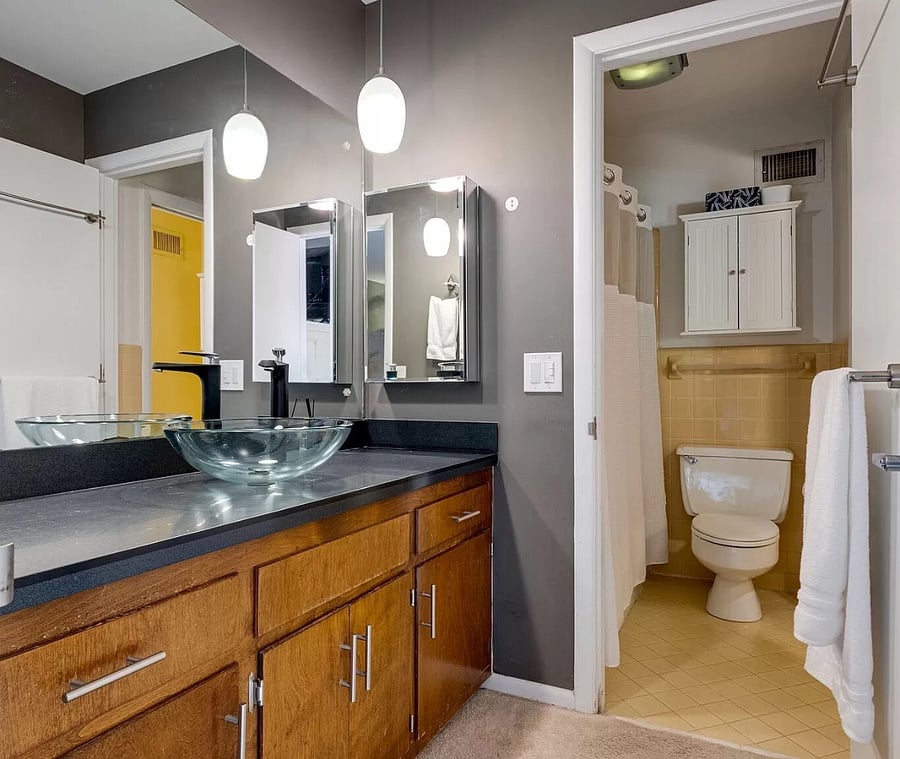 This is master bedroom-accessible vanity. The walk-in closet is just off to the right. This has been the "his" bathroom for as long as we've lived here.