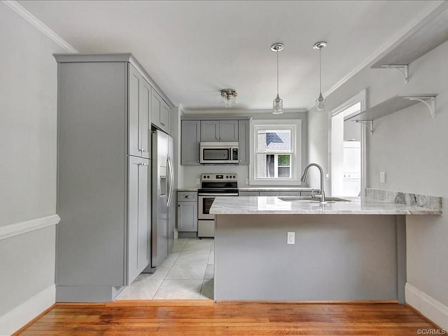 Open kitchen with dining room