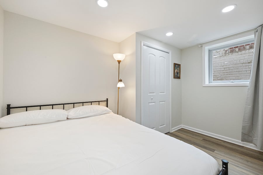  Second bedroom with soft lighting, closet storage, and a quiet atmosphere for peaceful sleep. Extra large window for natural light