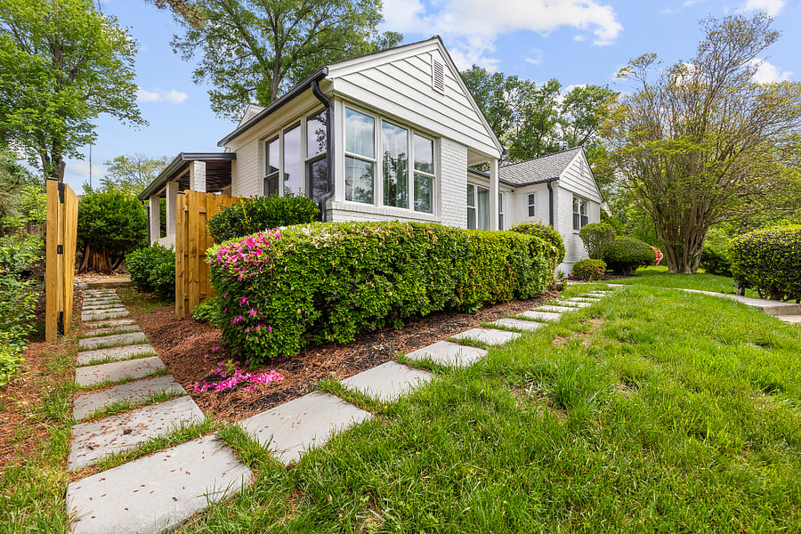(Front of house with garden path leading to private lower level entrance):
 Welcome to your Chevy Chase retreat  located in a peaceful, tree-lined neighborhood just minutes from NIH and Walter Reed.
