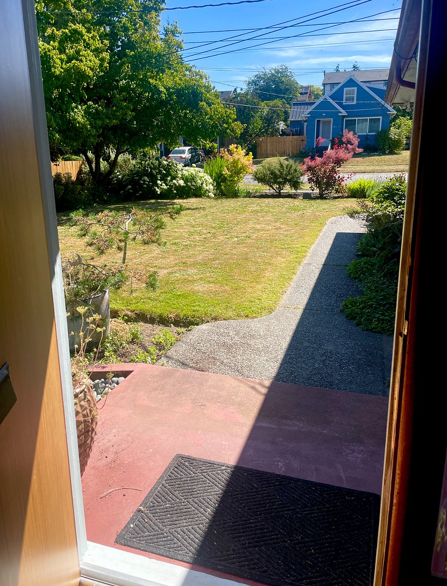 Front yard view looking from inside the entry way front door.