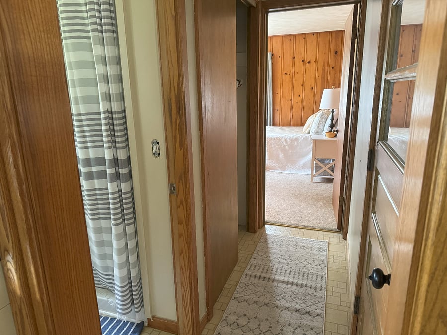 A suite like feel with bed and bathroom close by and with full back entry closet empty for additional storage space