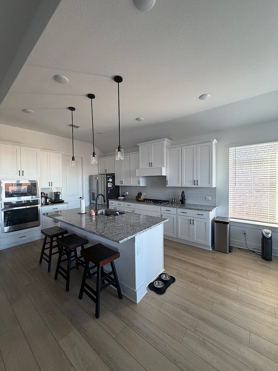 Open, bright kitchen and dining area