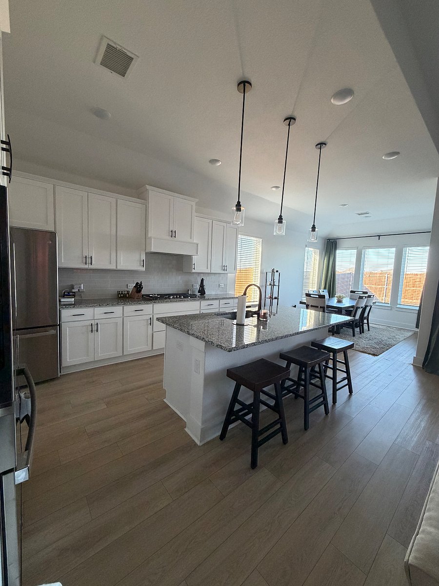 Large open gourmet, luxury kitchen with 12-foot ceiling