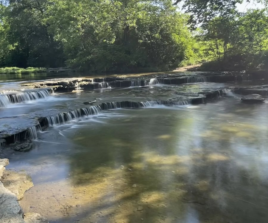 Through a small trail in the backyard, you can access a paved trail which leads to this beautiful waterfall about 15 or so minutes down the path. 
