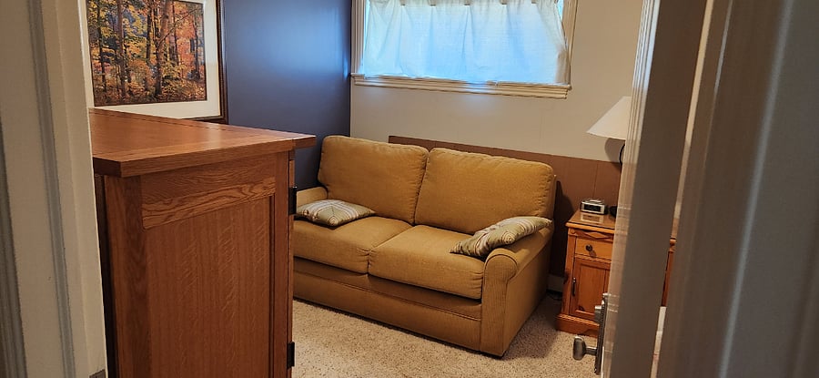 Comfortable, and relaxing den space for reading, catching up with family phone calls, and features a fold out, very comfortable, double bed for guests that may come and visit for a limited time.