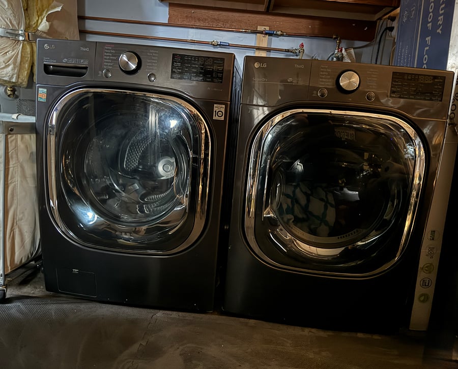 New LG smart, extremely quiet, steaming, large capacity washer and dryer located in attached garage