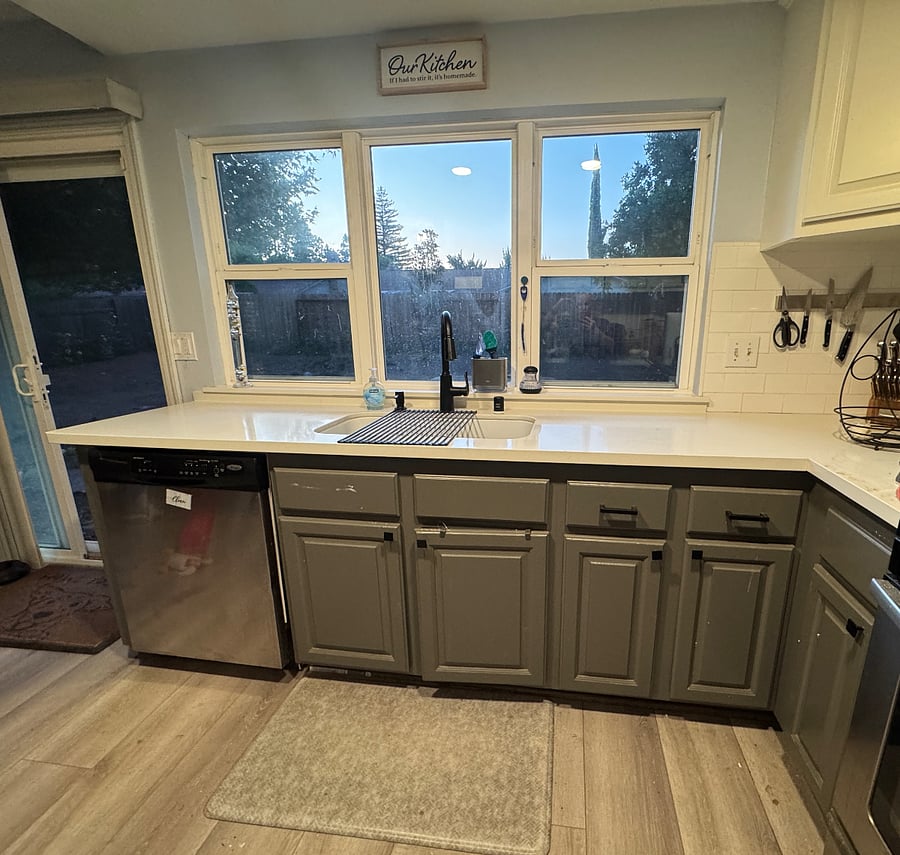 Kitchen including dishwasher and large farmhouse style sink