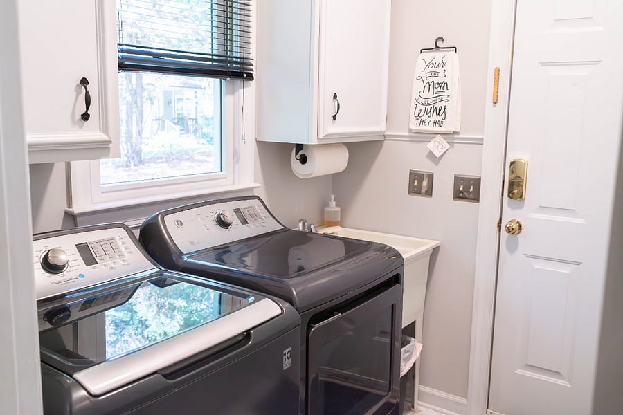 A shelf available for your preferred laundry supplies.