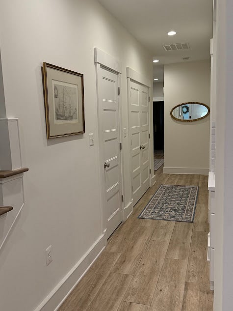 Hallway to bedrooms and bath.
