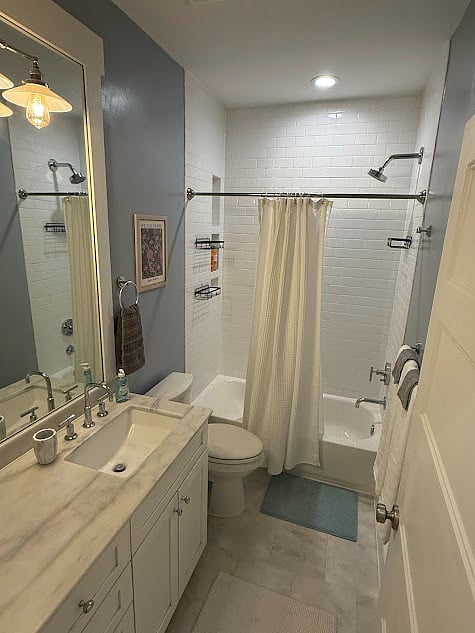 Bathroom with tub/shower.