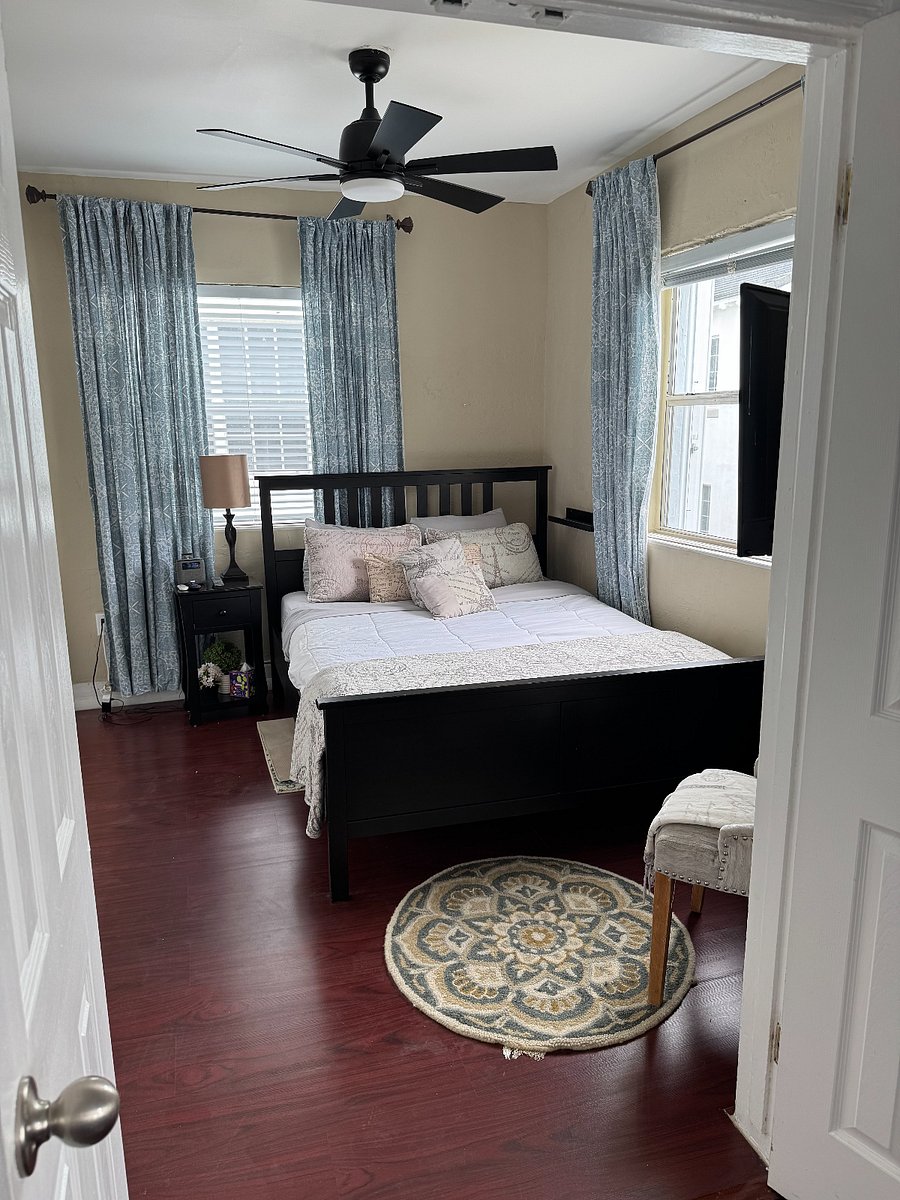 Bedroom #1 - Queen size bed, ceiling fan/light, night stand, with lamp and alarm/clock