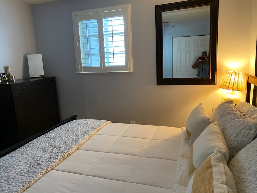 Main bedroom: Dresser - King size bed, TV in bedroom.