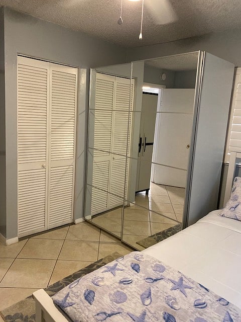 2nd bedroom: Mirrored closet, AC closet door (AC filters provided).