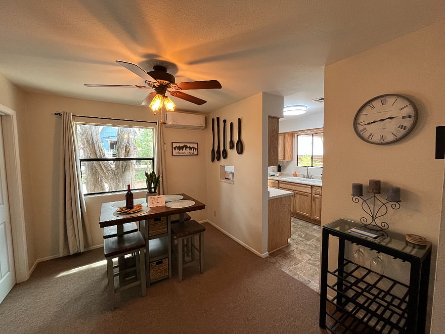 Dining Area. Updated photos with new laminate flooring coming soon.
