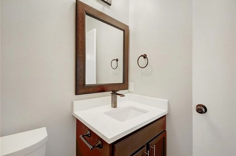 Half Bathroom located within the Master Bedroom
