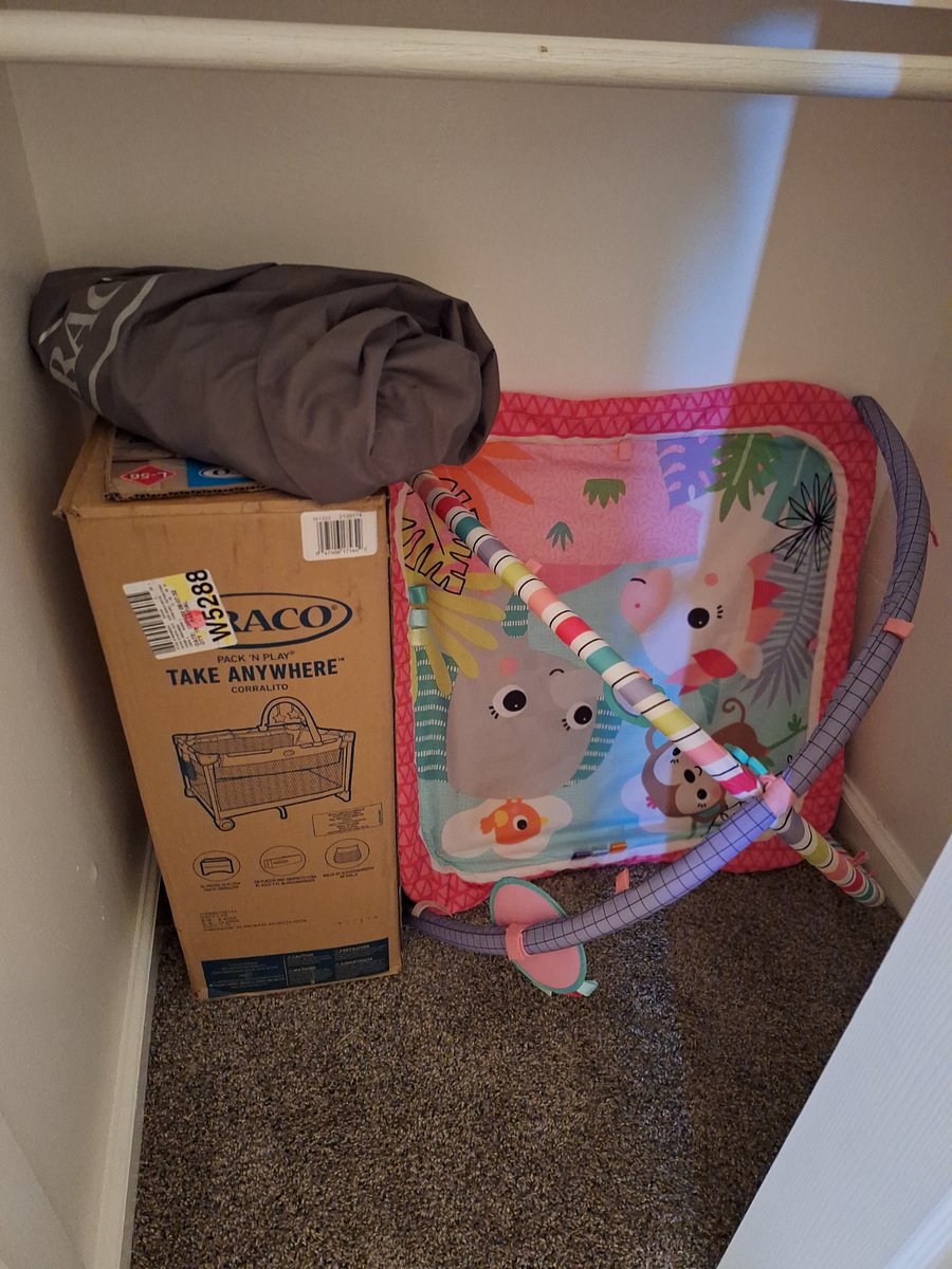 Pack and Play and play mat in master bedroom closet