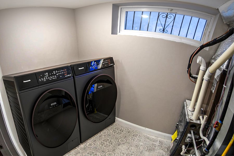 Shared in-unit laundry with washer and dryer.