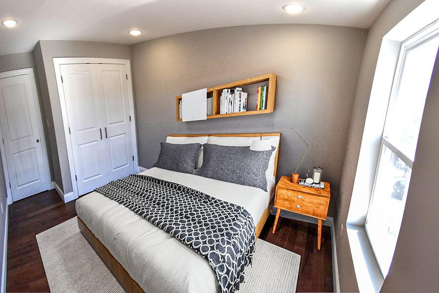 Bedroom #4 with queen size bed, 4K smart TV, closet organizer, night stand and wall bookshelf.