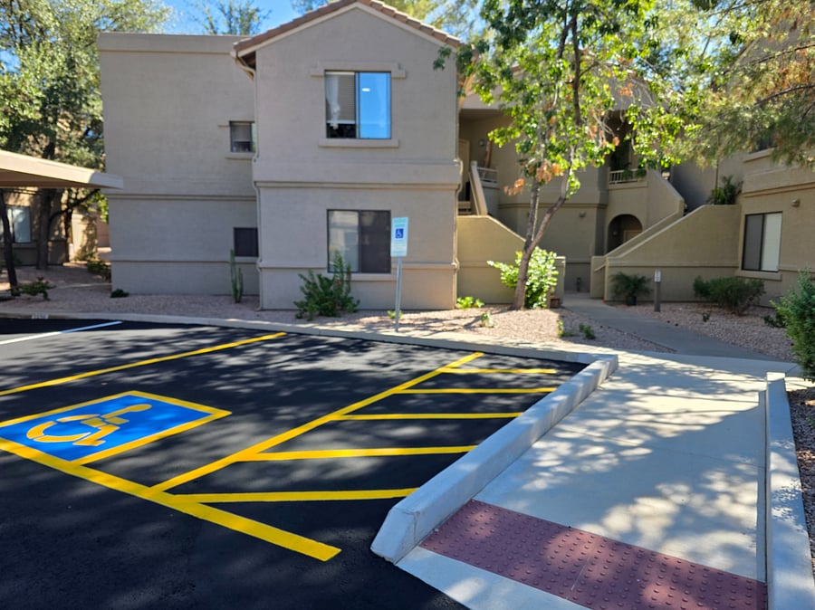 Handicap parking space and ramp in front of unit
