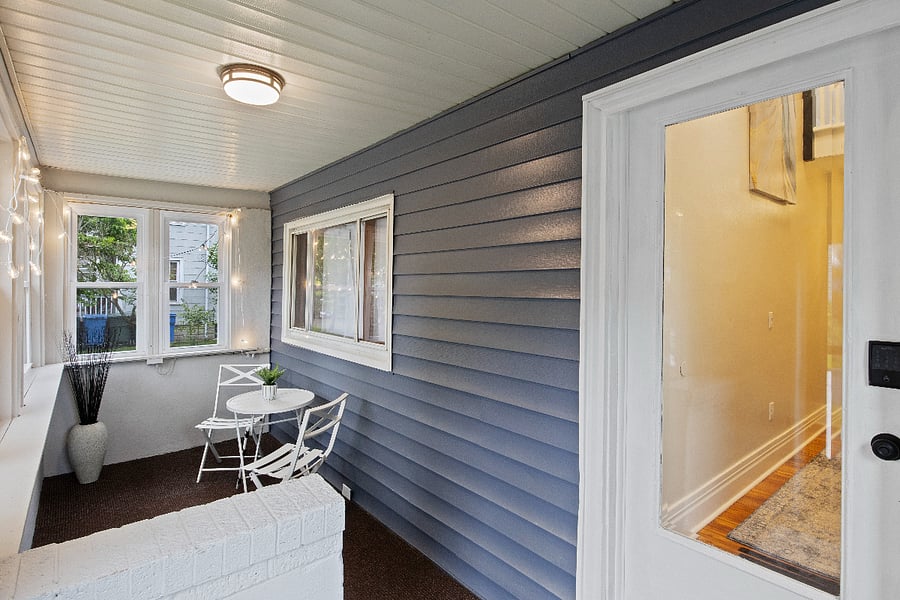 Porch with view into main entrance.