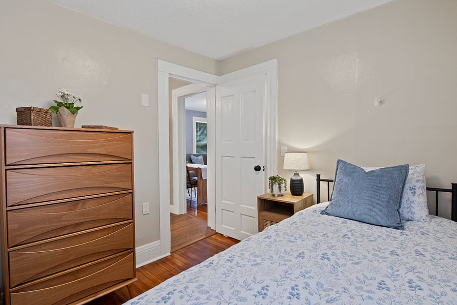 Twin XL bedroom dresser with view into kitchen and living room