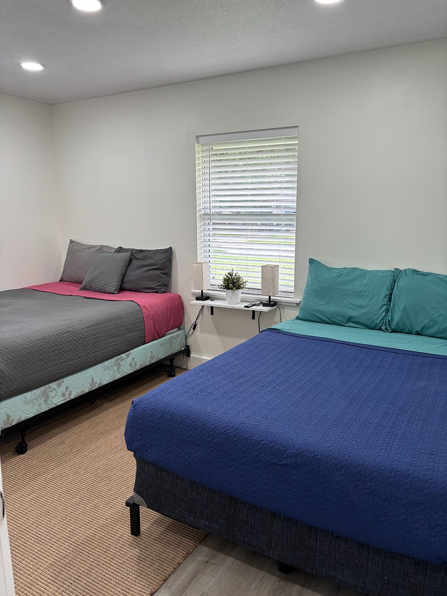 Bedroom 2 w Queen bed, Full bed and oversized closet. Lamps and power/charging cords for each bed