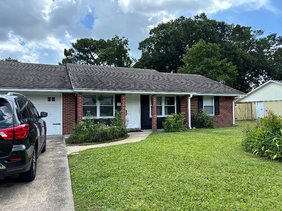Single car garage and extended driveway holds 3 vehicles
