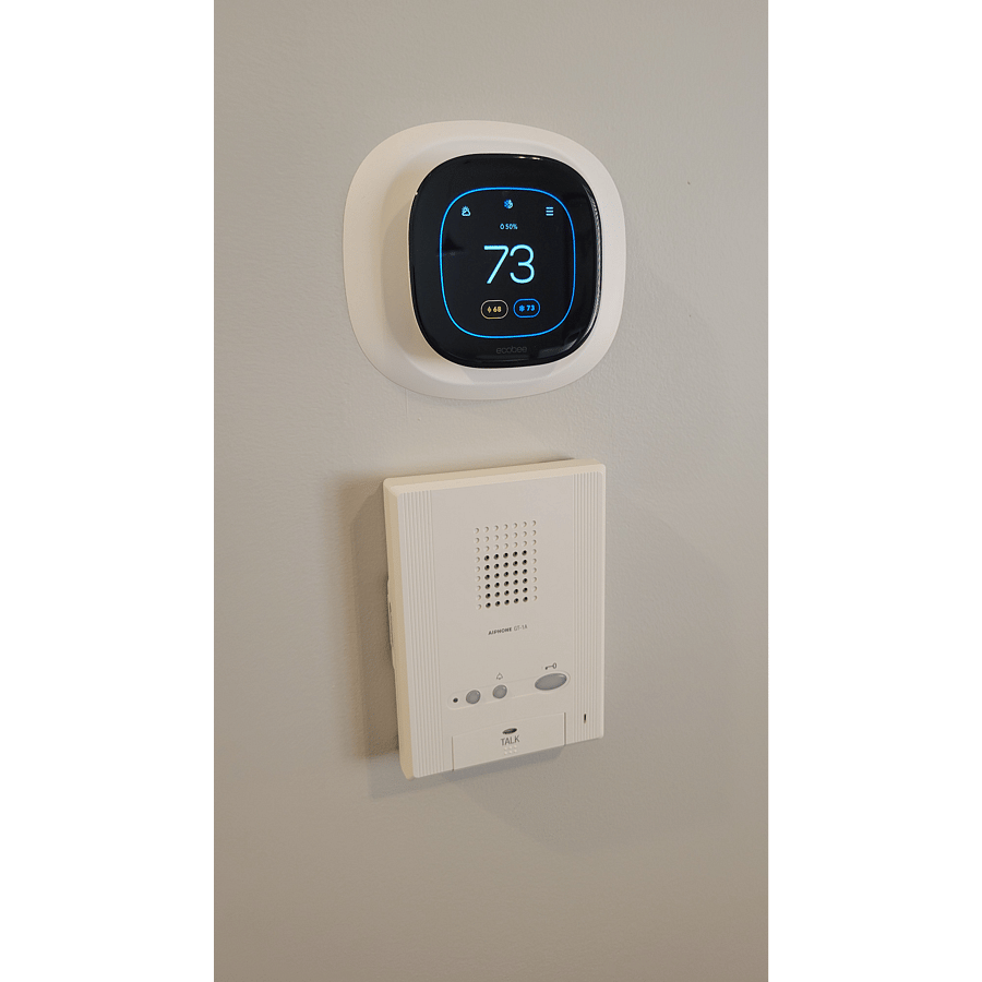 Two-way tenant communication with unlock button for visitors and ecobee thermostat.
