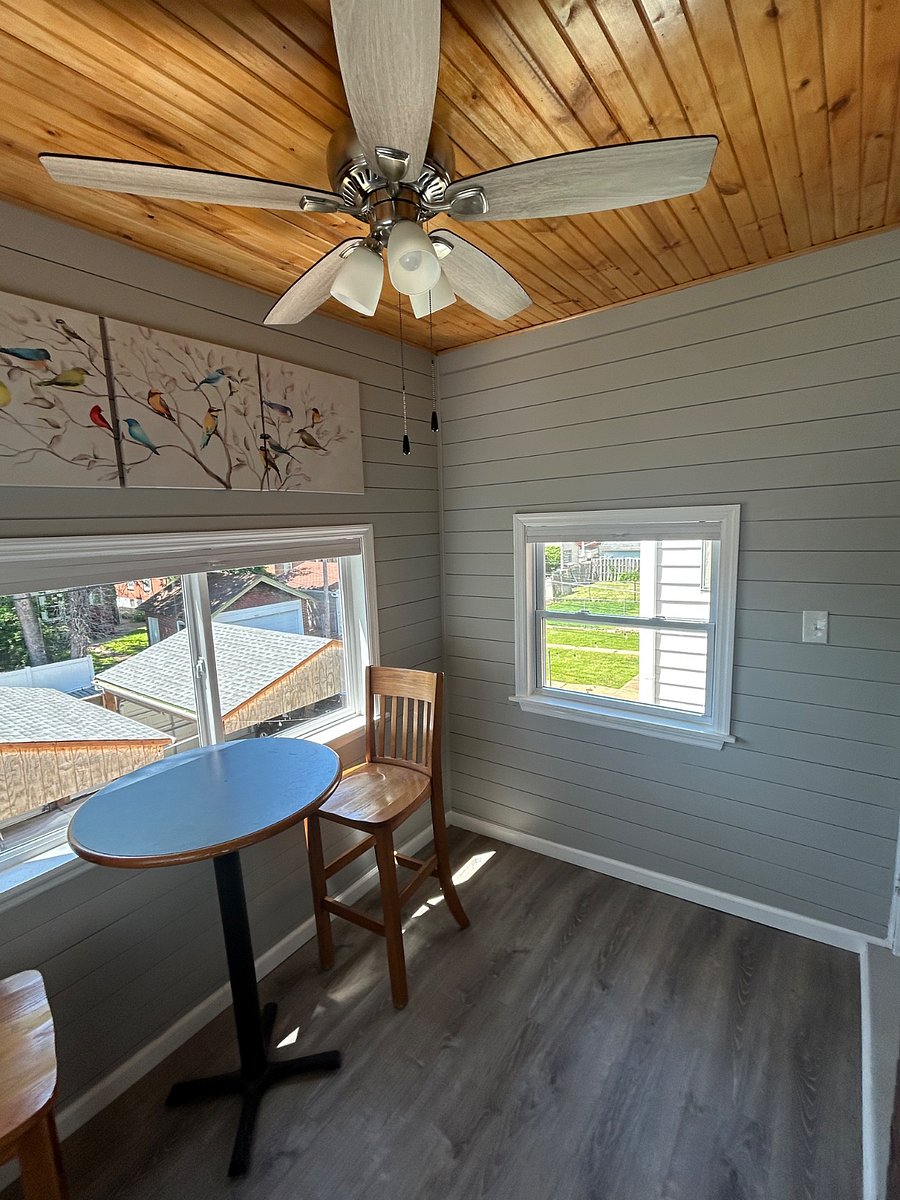 The sunroom is a great place for coffee or work from home space