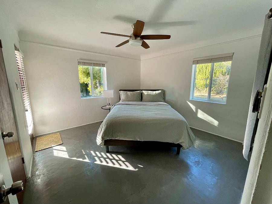 Second bedroom with queen bed and ample storage