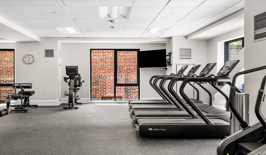 GYM & FITNESS CENTER
-- (INTERIOR AMENITY / COMMON SPACE)
-- open to all residents in the building.