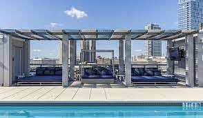 ROOFTOP LOUNGE & SWIMMING POOL
-- (EXTERIOR AMENITY / COMMON SPACE)
-- open to all residents in the building.